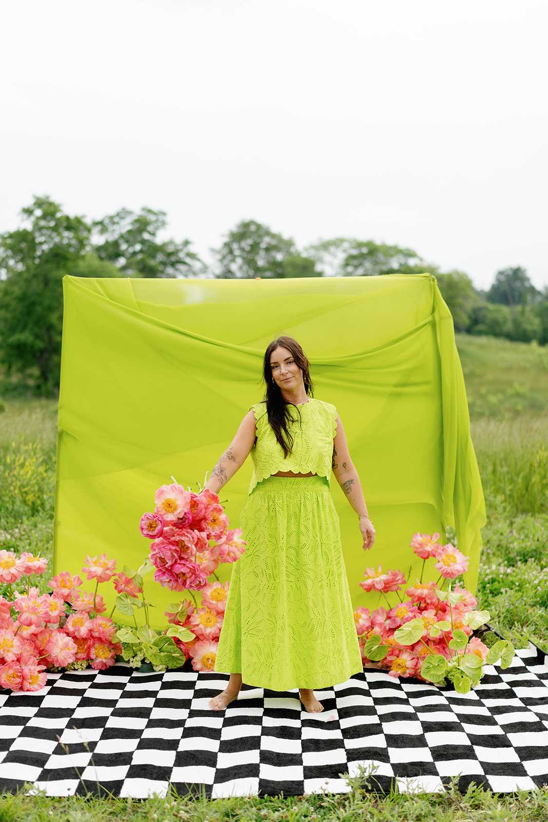 Sarina holding a bouquet of flowers